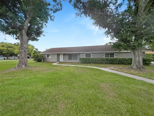 1215 Merlyn St, Lakeland, FL 33813 - ranch-style home featuring a front yard