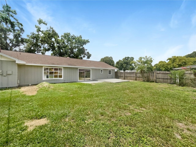 1215 Merlyn St, Lakeland, FL 33813 - back of house with a patio area
