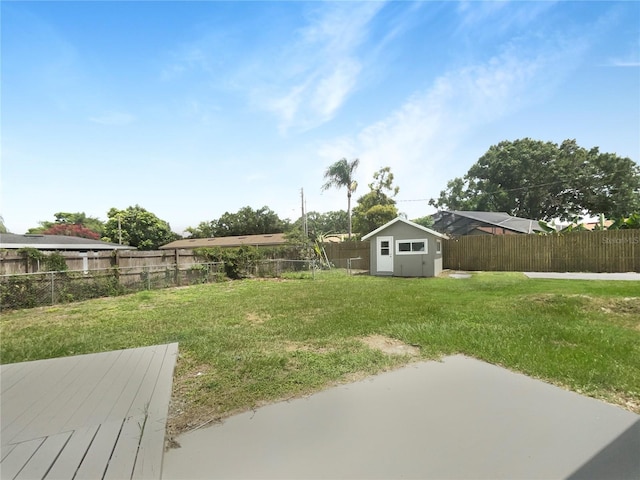1215 Merlyn St, Lakeland, FL 33813 - fenced backyard featuring a storage shed