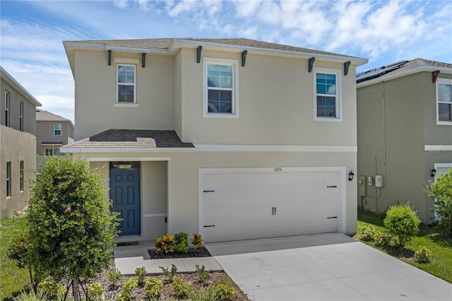 1296 Berry Ln, Davenport, FL 33837 - traditional-style house featuring stucco siding, an attached garage, driveway, and a shingled roof