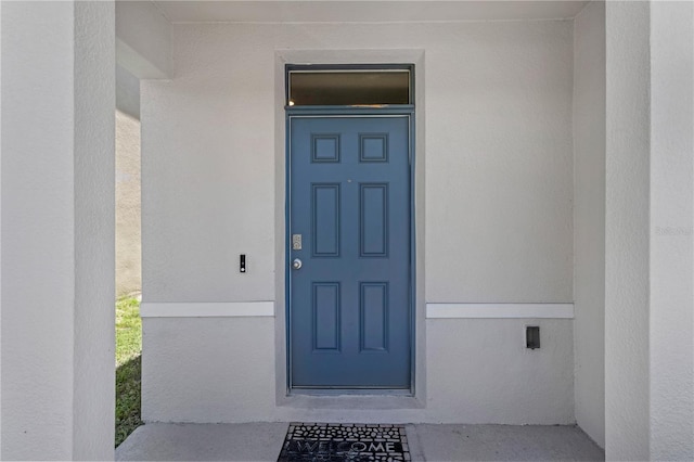 1296 Berry Ln, Davenport, FL 33837 - property entrance featuring stucco siding