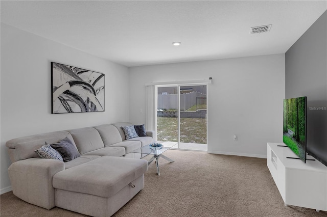 1296 Berry Ln, Davenport, FL 33837 - carpeted living room featuring baseboards and recessed lighting