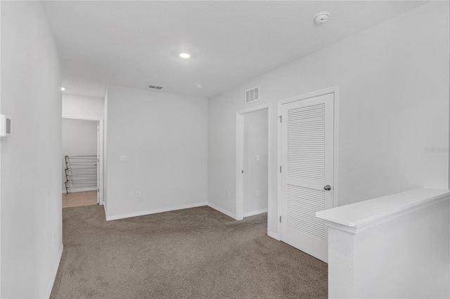 1296 Berry Ln, Davenport, FL 33837 - carpeted spare room featuring a smoke detector and recessed lighting