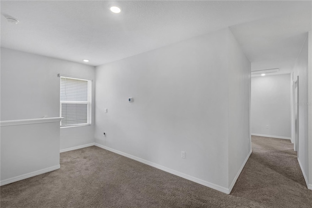 1296 Berry Ln, Davenport, FL 33837 - carpeted spare room featuring a smoke detector and recessed lighting