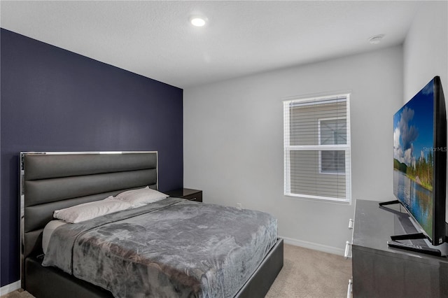 1296 Berry Ln, Davenport, FL 33837 - bedroom featuring light colored carpet and baseboards