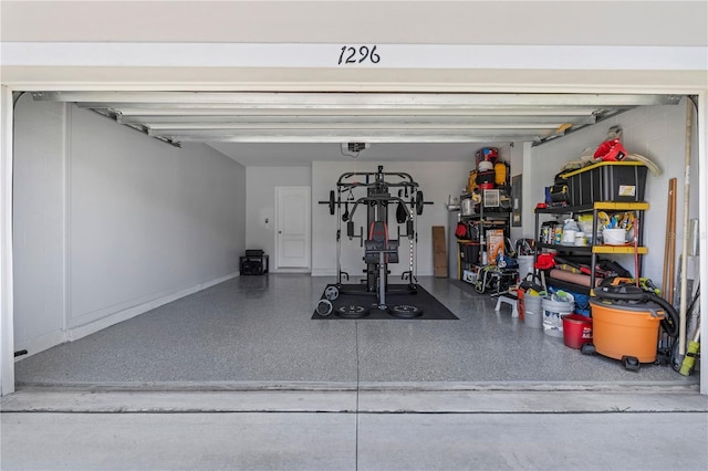 1296 Berry Ln, Davenport, FL 33837 - garage featuring a garage door opener