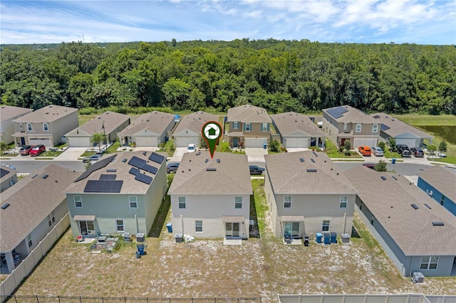 1296 Berry Ln, Davenport, FL 33837 - aerial perspective of suburban area featuring a heavily wooded area