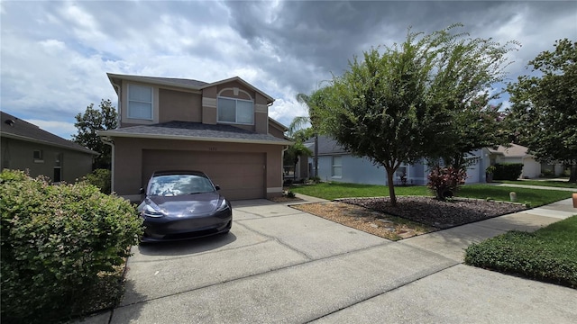 1632 Slash Pine Pl, Oviedo, FL 32765 - traditional home featuring stucco siding, concrete driveway, a front yard, and an attached garage