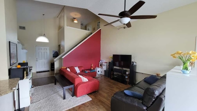 1632 Slash Pine Pl, Oviedo, FL 32765 - living area featuring a ceiling fan, wood finished floors, and a high ceiling