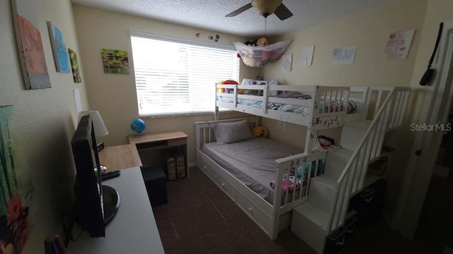 1632 Slash Pine Pl, Oviedo, FL 32765 - carpeted bedroom featuring a textured ceiling and ceiling fan