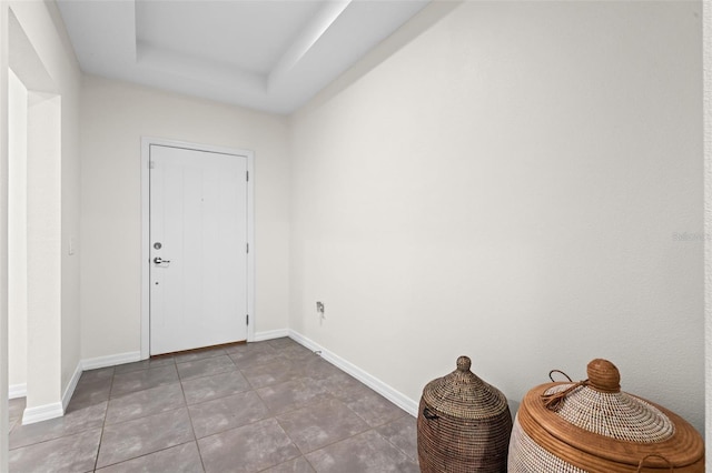 1330 Bucktail Ct, Kissimmee, FL 34746 - tiled foyer with baseboards and a tray ceiling