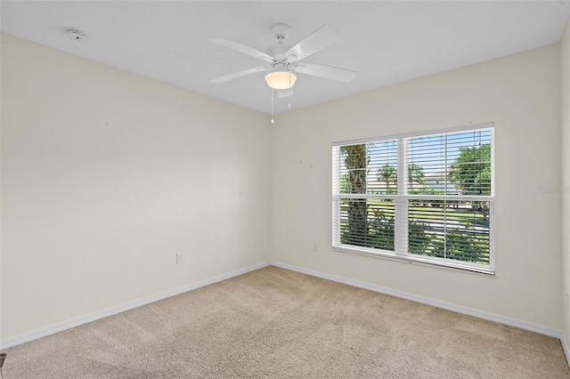 1330 Bucktail Ct, Kissimmee, FL 34746 - carpeted empty room featuring a smoke detector and a ceiling fan