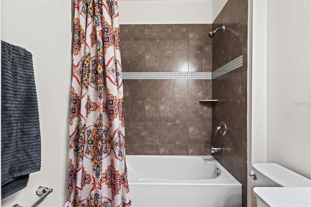 1330 Bucktail Ct, Kissimmee, FL 34746 - bathroom with toilet and shower / bath combination with curtain