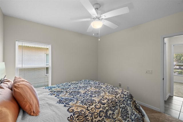 1330 Bucktail Ct, Kissimmee, FL 34746 - carpeted bedroom featuring baseboards and ceiling fan