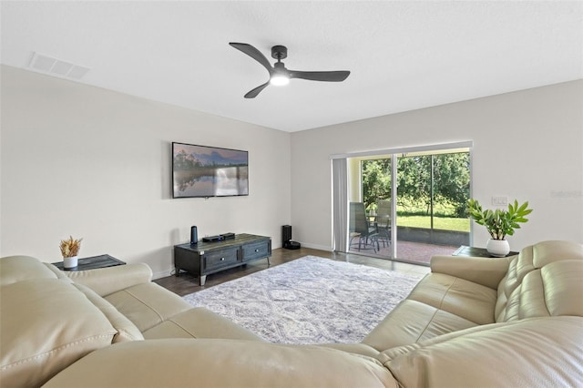 1330 Bucktail Ct, Kissimmee, FL 34746 - living area featuring baseboards and ceiling fan