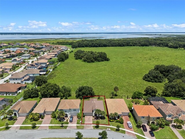 1330 Bucktail Ct, Kissimmee, FL 34746 - aerial perspective of suburban area featuring a large body of water and property boundaries highlighted