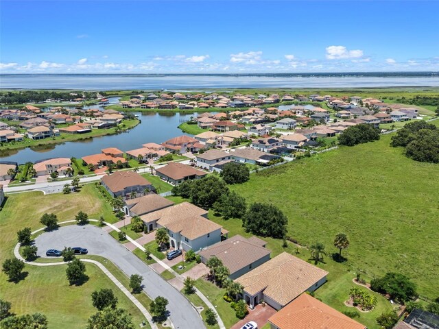 1330 Bucktail Ct, Kissimmee, FL 34746 - aerial perspective of suburban area with a large body of water