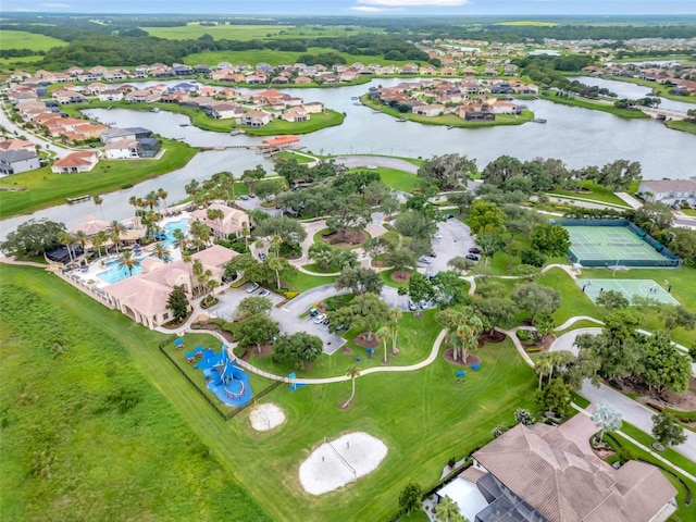 1330 Bucktail Ct, Kissimmee, FL 34746 - aerial view of property and surrounding area featuring nearby suburban area and a large body of water