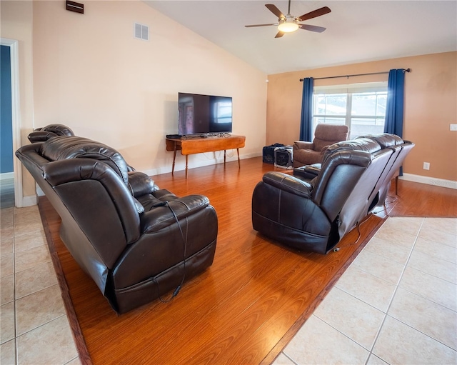 6420 Addax Ave, Cocoa, FL 32927 - living area with vaulted ceiling, ceiling fan, and light tile patterned floors