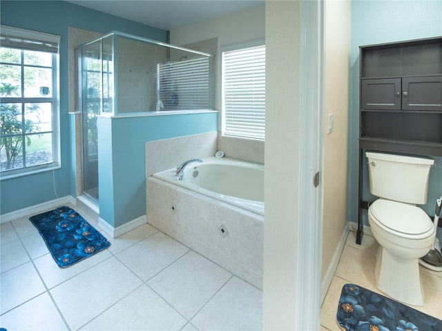 6420 Addax Ave, Cocoa, FL 32927 - full bathroom featuring a garden tub, a shower stall, and tile patterned floors