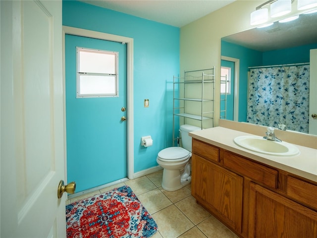 6420 Addax Ave, Cocoa, FL 32927 - full bathroom featuring vanity, tile patterned floors, and a shower with shower curtain