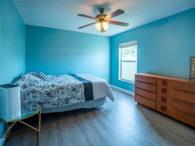 6420 Addax Ave, Cocoa, FL 32927 - bedroom featuring wood finished floors and ceiling fan