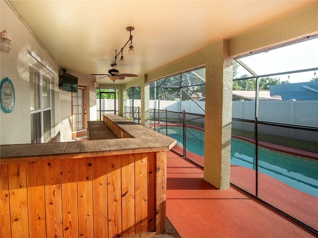 6420 Addax Ave, Cocoa, FL 32927 - unfurnished sunroom featuring a ceiling fan