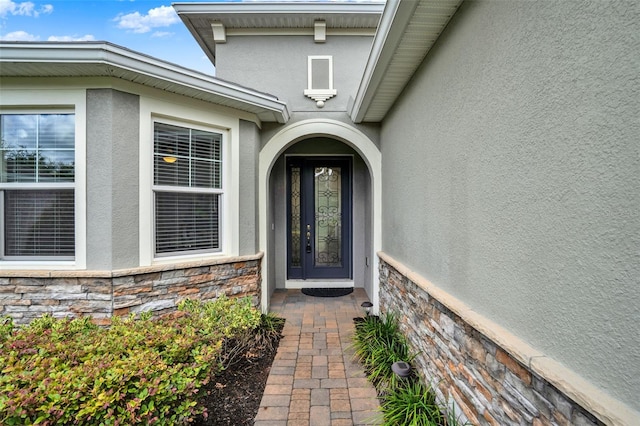 470 Briarbrook Way, Deland, FL 32724 - view of exterior entry with stone siding and stucco siding