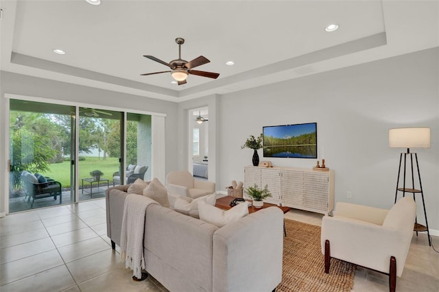 470 Briarbrook Way, Deland, FL 32724 - living room featuring a tray ceiling, ceiling fan, light tile patterned flooring, and recessed lighting