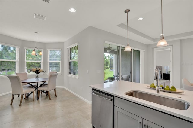 470 Briarbrook Way, Deland, FL 32724 - kitchen featuring stainless steel dishwasher, light countertops, hanging light fixtures, gray cabinetry, and recessed lighting
