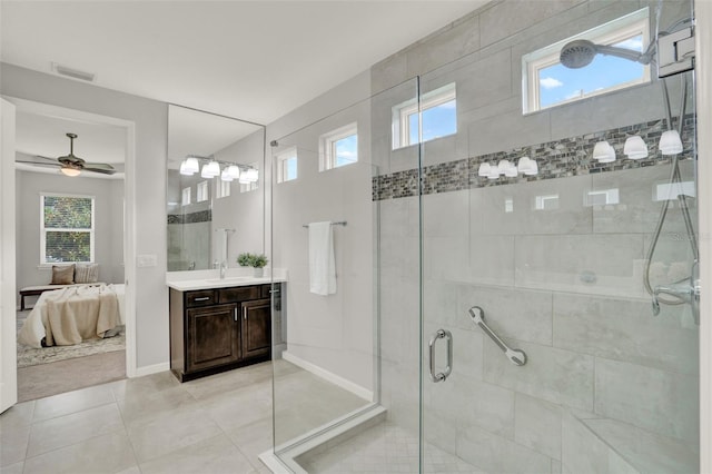 470 Briarbrook Way, Deland, FL 32724 - ensuite bathroom featuring vanity, healthy amount of natural light, a shower stall, and ceiling fan