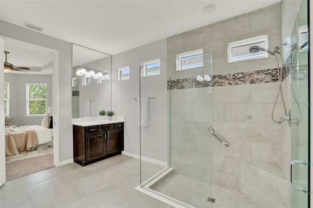 470 Briarbrook Way, Deland, FL 32724 - full bath featuring ensuite bath, vanity, a shower stall, tile patterned floors, and a ceiling fan