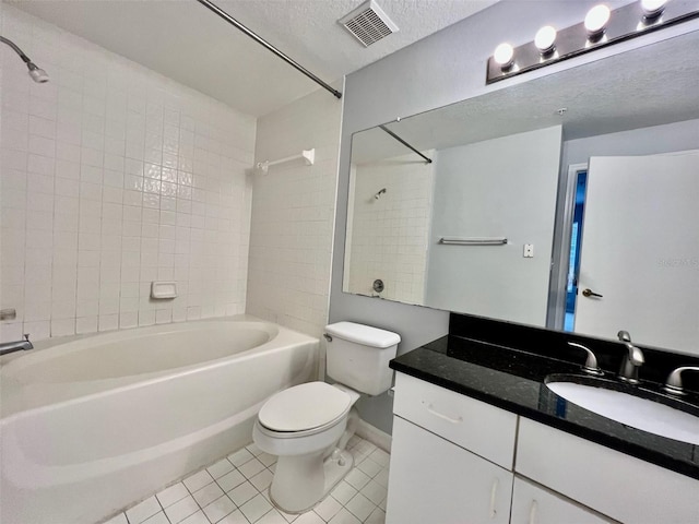 5566 Metrowest Blvd Unit 2-105, Orlando, FL 32811 - bathroom featuring tile patterned flooring, tub / shower combination, vanity, and a textured ceiling