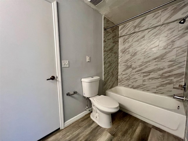 5566 Metrowest Blvd Unit 2-105, Orlando, FL 32811 - bathroom featuring shower / washtub combination and wood finished floors