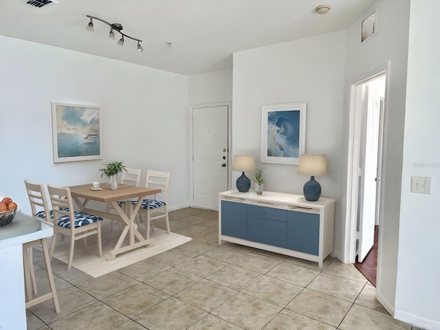 6153 Metrowest Blvd Unit 205, Orlando, FL 32835 - dining room featuring light tile patterned floors