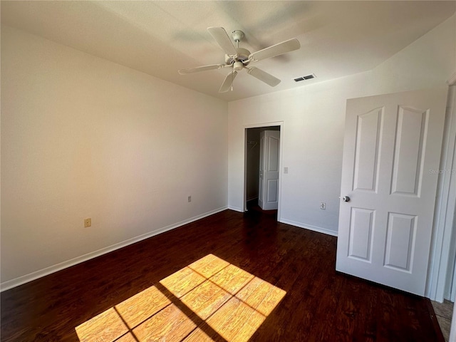 6153 Metrowest Blvd Unit 205, Orlando, FL 32835 - unfurnished bedroom with wood finished floors and a ceiling fan