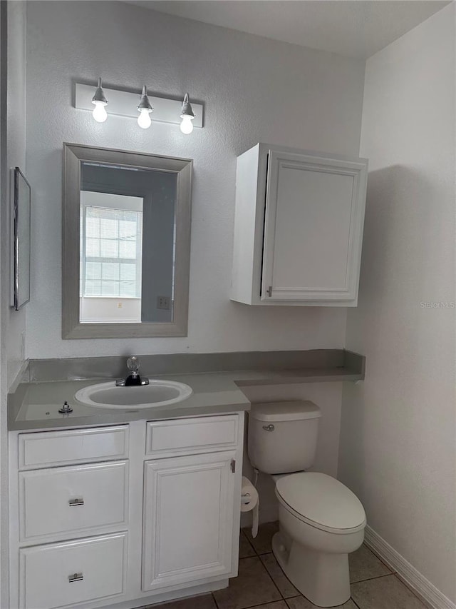 6153 Metrowest Blvd Unit 205, Orlando, FL 32835 - bathroom featuring tile patterned floors and vanity