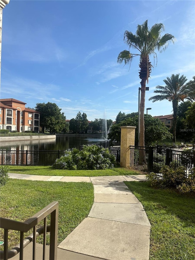 6153 Metrowest Blvd Unit 205, Orlando, FL 32835 - view of yard with a water view