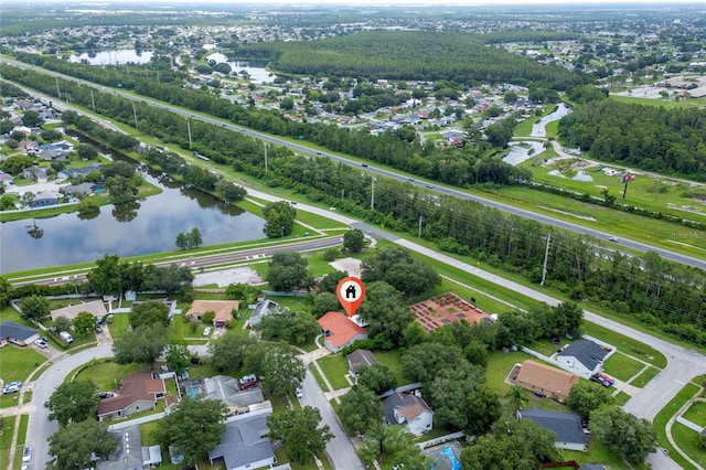 2666 Capp Cir, Kissimmee, FL 34744 - aerial view of property's location with a nearby body of water and nearby suburban area
