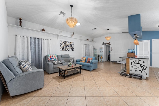2666 Capp Cir, Kissimmee, FL 34744 - living area with lofted ceiling and light tile patterned floors