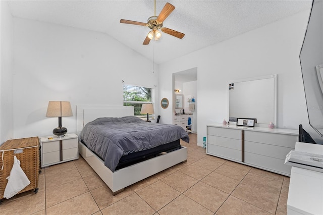2666 Capp Cir, Kissimmee, FL 34744 - bedroom featuring vaulted ceiling, light tile patterned floors, and a ceiling fan