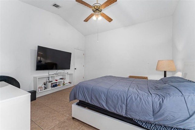 2666 Capp Cir, Kissimmee, FL 34744 - bedroom featuring vaulted ceiling, light tile patterned flooring, and ceiling fan