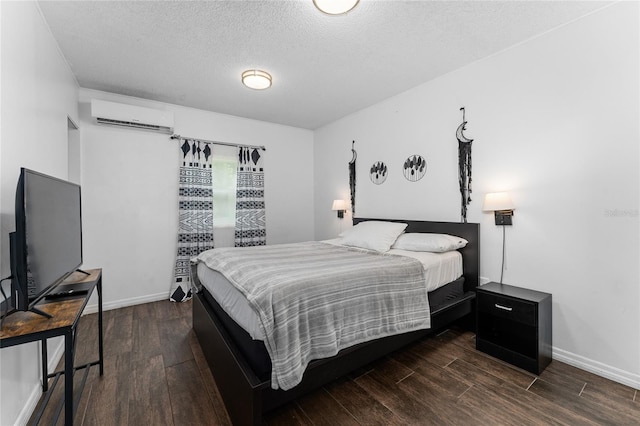 2666 Capp Cir, Kissimmee, FL 34744 - bedroom with a wall unit AC, dark wood-style flooring, and a textured ceiling