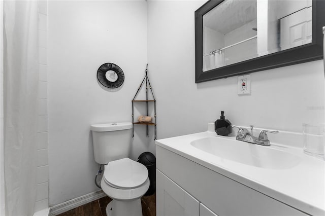 2666 Capp Cir, Kissimmee, FL 34744 - full bath with vanity, wood finished floors, and a shower with curtain