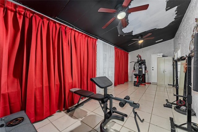 2666 Capp Cir, Kissimmee, FL 34744 - workout area featuring a ceiling fan, tile patterned floors, and vaulted ceiling