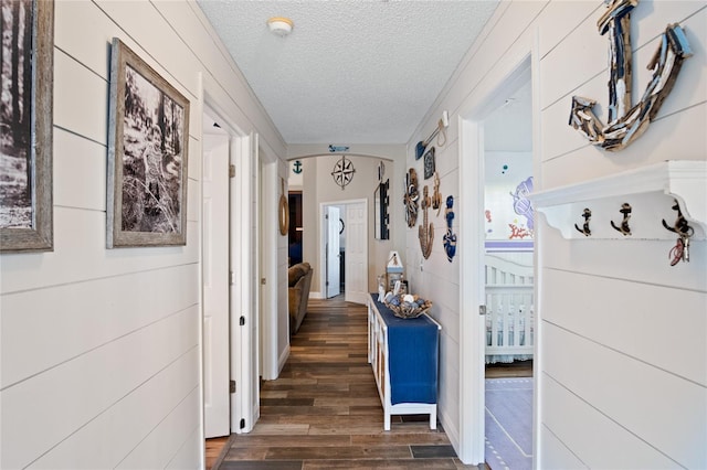 1145 Jaybee Ave, Davenport, FL 33897 - hall featuring a textured ceiling and dark wood finished floors