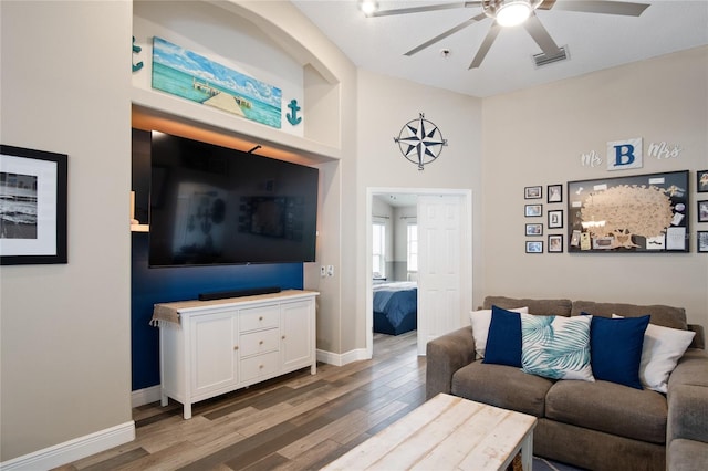 1145 Jaybee Ave, Davenport, FL 33897 - living area with ceiling fan and light wood-style flooring