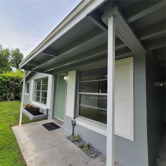 4118 Kirkland Blvd, Orlando, FL 32811 - property entrance with a lawn