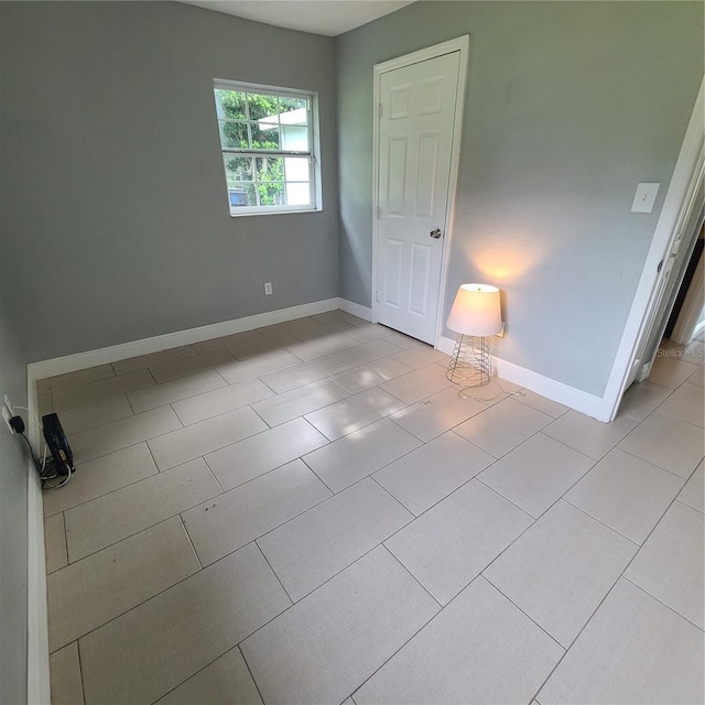 4118 Kirkland Blvd, Orlando, FL 32811 - empty room with light tile patterned flooring