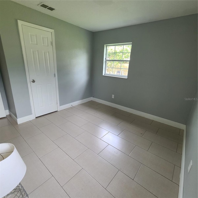 4118 Kirkland Blvd, Orlando, FL 32811 - empty room featuring light tile patterned floors and baseboards